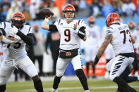 Cincinnati Bengals quarterback Joe Burrow (9) pases from the pocket against the Tennessee Titans during the first half of an NFL divisional round playoff football game, Saturday, Jan. 22, 2022, in Nashville, Tenn. (AP Photo/John Amis)