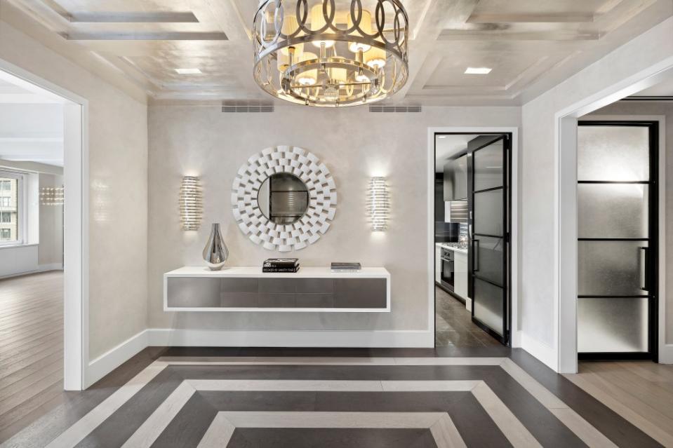 The custom entry sports a chandelier. Richard Caplan