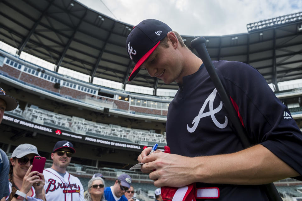 ATLANTA, GA - MAY 15: Mike Soroka #40 of the Atlanta Braves signs autographs against the Chicago Cubs at SunTrust Park on May 15, 2018, in Atlanta, Georgia. The Cubs won 3-2. (Photo by Logan Riely/Beam Imagination/Atlanta Braves/Getty Images) *** Local Caption ***