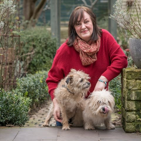 Debora with her dogs Barney and Gracie - Credit:  Andrew Crowley