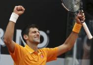 Novak Djokovic of Serbia celebrates after winning his semi-final match against David Ferrer of Spain at the Rome Open tennis tournament in Rome, Italy, May 16, 2015. REUTERS/Stefano Rellandini