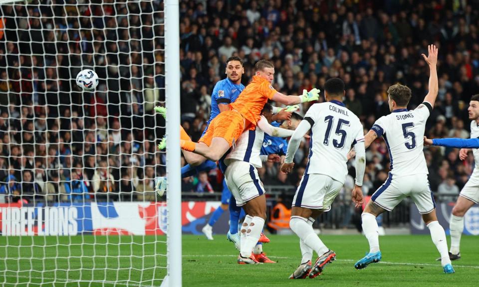 <span>Konstantinos Mavropanos puts the ball past a sprawling Jordan Pickford for Greece before the goal is disallowed.</span><span>Photograph: Toby Melville/Reuters</span>