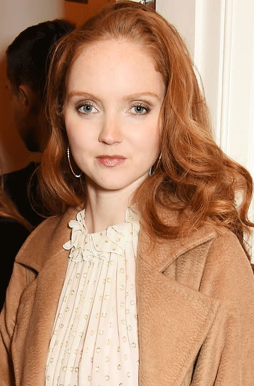 The model flaunted her fiery red mane, her flawless fair skin, her breathtaking blue eyes and little shimmery bronze lips at the Stella McCartney Bruton Street Store in London.