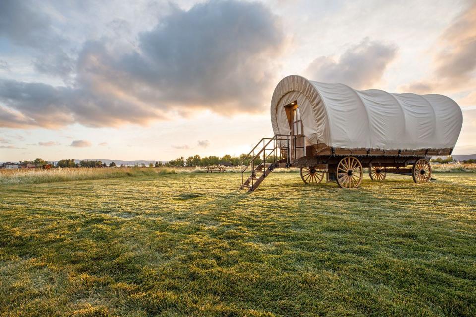 Binghamton Jellystone Park offers a variety of lodging options, including luxury wagon rentals that include a queen size bed and twin bunk beds, plus modern amenities like electricity.