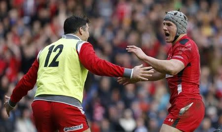 Wales' Jonathan Davies celebrates scoring a try against Scotland during their Six Nations rugby union match at Murrayfield Stadium in Edinburgh, Scotland, February 15, 2015. REUTERS/Russell Cheyne