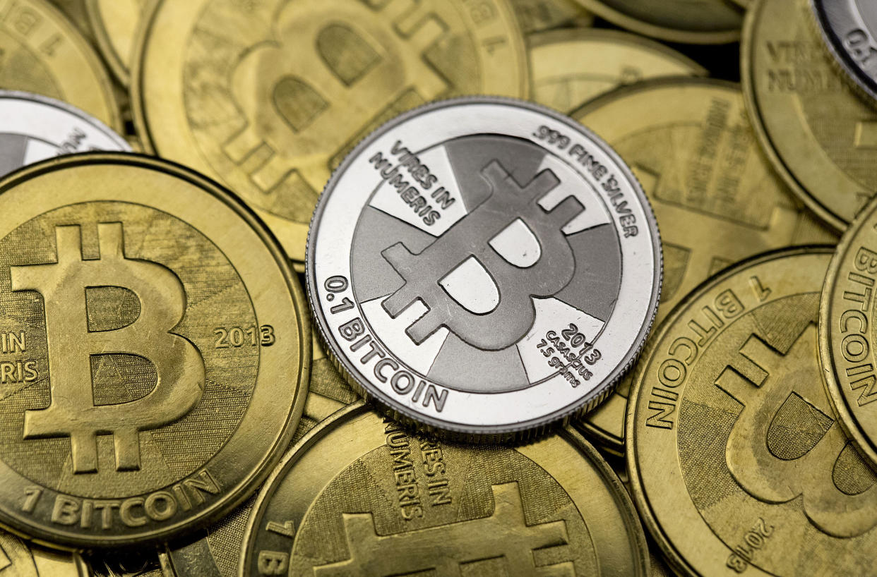 Some of Bitcoin enthusiast Mike Caldwell's coins are pictured at his office in this photo illustration in Sandy, Utah, January 31, 2014. REUTERS/Jim Urquhart  REUTERS/Jim Urquhart   (UNITED STATES - Tags: BUSINESS)