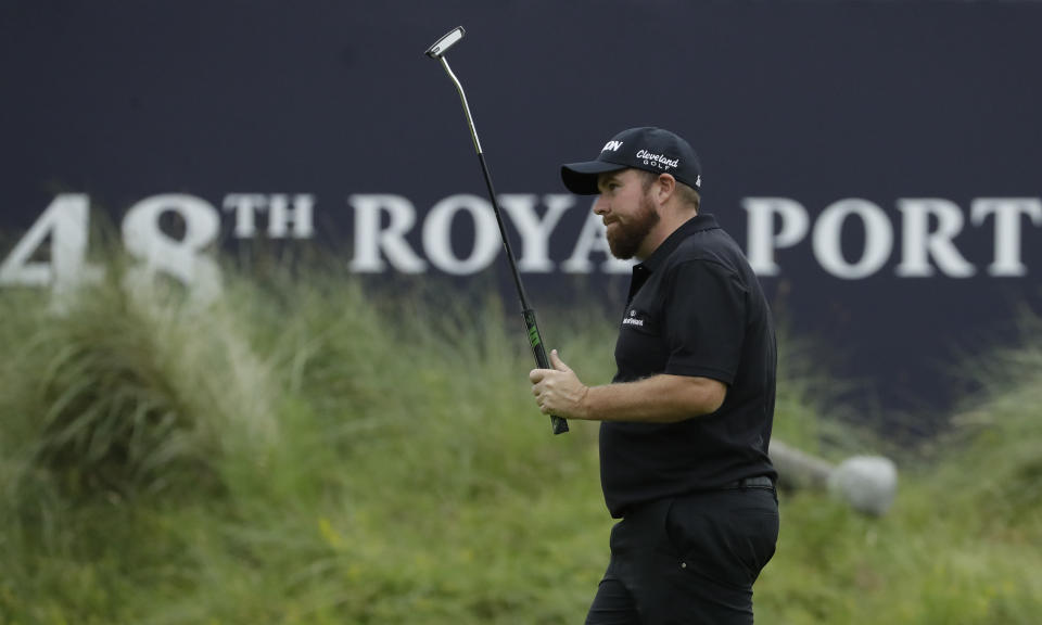 Ireland's Shane Lowry acknowledges the crowd after the competed his second round on the 18th green in British Open Golf Championships at Royal Portrush in Northern Ireland, Friday, July 19, 2019.(AP Photo/Matt Dunham)