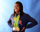 <p>Emotion meets critical historical flashbacks with Simone Manuel. Manuel's 100-meter freestyle marked the first time an African-American woman won in an individual swimming event. A big deal considering that not many years ago, whole swimming pools would be drained if a black person dipped their toe in the water. This was a win worth smiling about. (Photo by Harry How/Getty Images) </p>