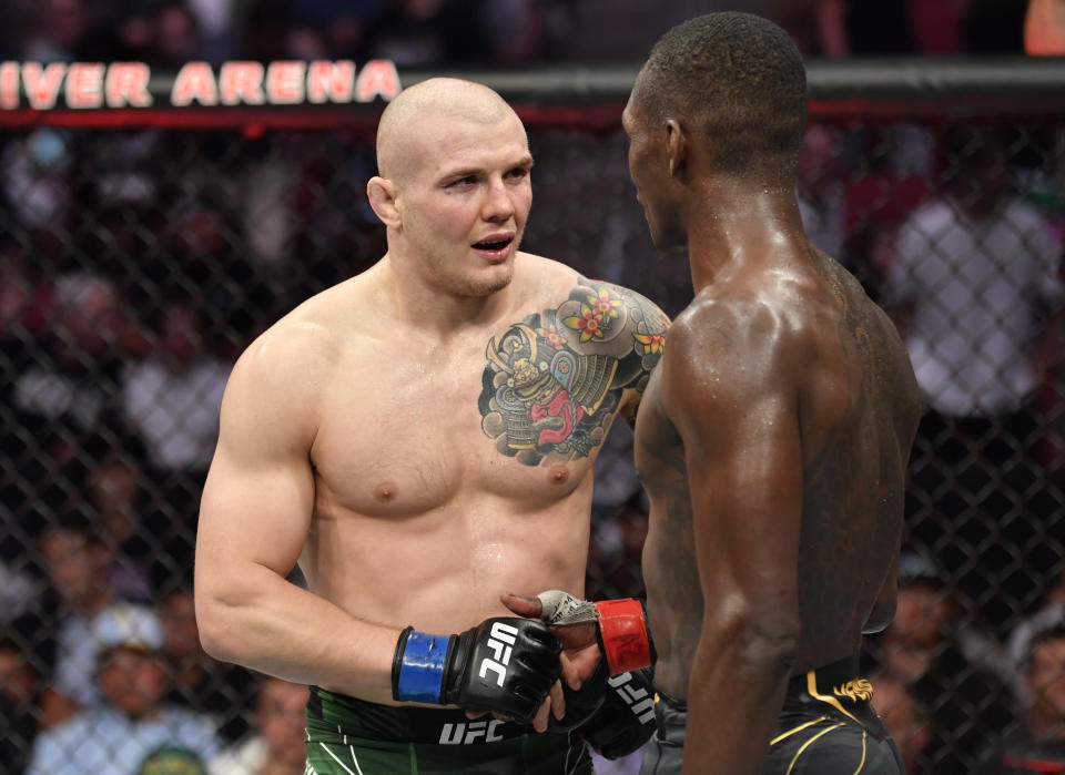 GLENDALE, ARIZONA - JUNE 12: (R-L) Israel Adesanya of Nigeria and Marvin Vettori of Italy talk after their UFC middleweight championship fight during the UFC 263 event at Gila River Arena on June 12, 2021 in Glendale, Arizona. (Photo by Jeff Bottari/Zuffa LLC)