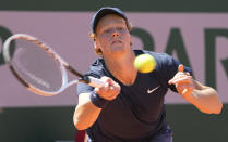 Italy's Jannik Sinner plays a return to Pierre-Hugues Herbert of France during their first round match on day two of the French Open tennis tournament at Roland Garros in Paris, France, Monday, May 31, 2021. (AP Photo/Michel Euler)