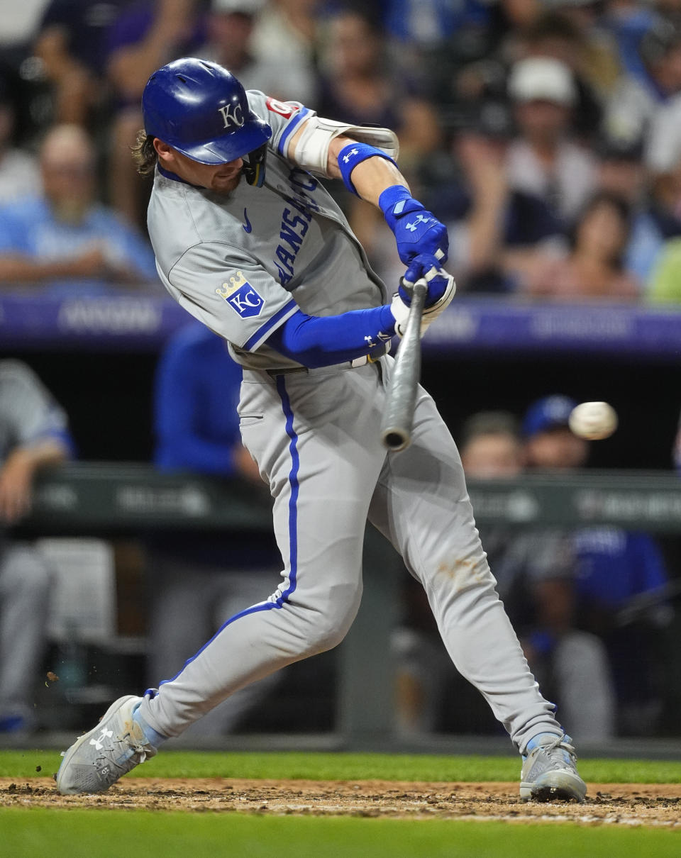 Kansas City Royals' Bobby Witt Jr. singles off Colorado Rockies relief pitcher Tyler Kinley in the eighth inning of a baseball game Saturday, July 6, 2024, in Denver. (AP Photo/David Zalubowski)