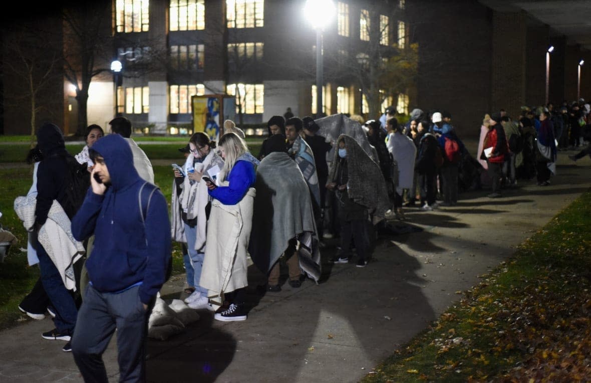 Hundreds of University of Michigan students wait in line to register to vote at the Ann Arbor city clerk’s satellite office at the university’s Museum of Art on Nov. 8, 2022. (Ryan Stanton/Ann Arbor News via AP, File)