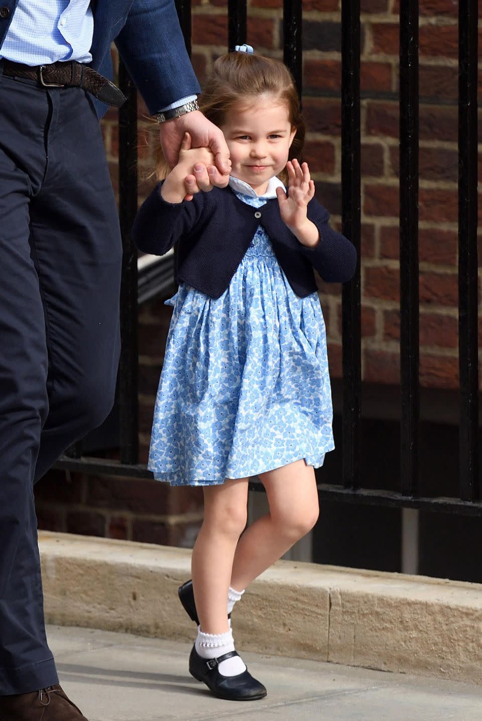 Princess Charlotte's adorable wave has seen hearts melt around the world. Photo: Getty