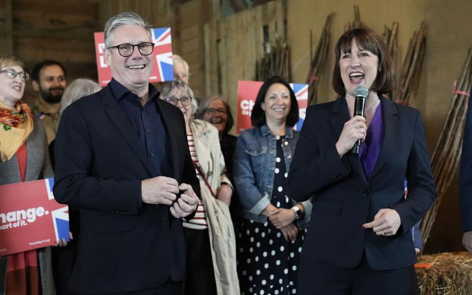 Rachel Reeves, the shadow chancellor, takes to the microphone at Heath Farm, Swerford, alongside Sir Keir Starmer