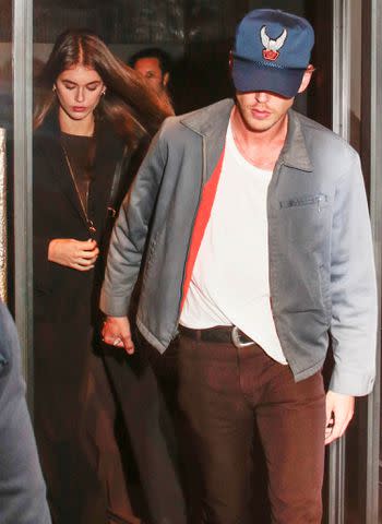 <p>Spread Pictures / MEGA</p> Kaia Gerber and Austin Butler hold hands leaving Costes restaurant in Paris