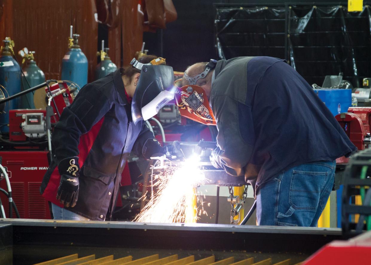 Stark State College students use the welding equipment at the college's Welding and Joining Center in Akron, which opened last fall. Stark State plans to open a 13-booth Welding and Joining Center at its Jackson Township campus in August 2024.