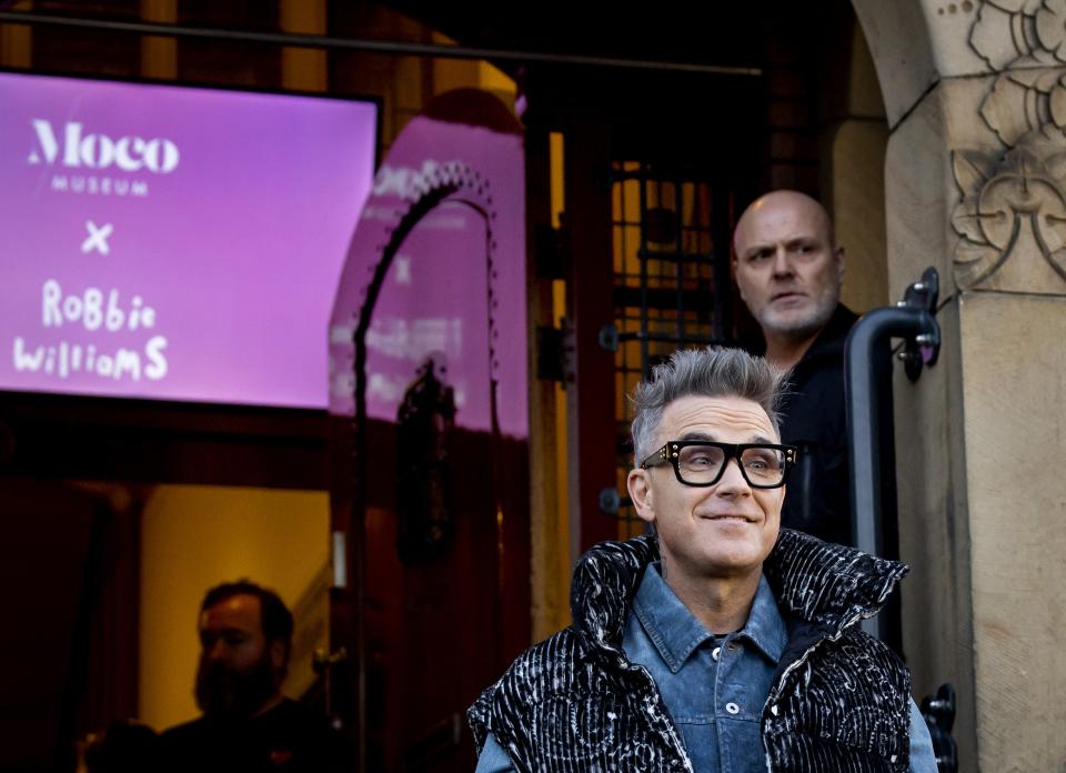 Robbie Williams has taken his love for art all the way to a new exhibition in the Netherlands. (AFP/Getty)