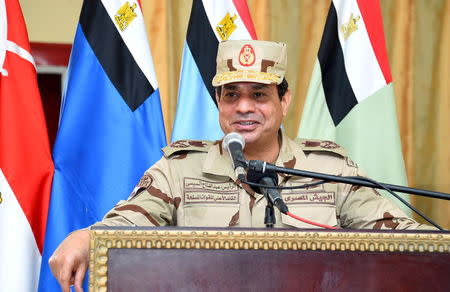 Egyptian President Abdel Fattah al-Sisi speaks during a meeting with members of the Egyptian armed forces, after travelling to the troubled northern part of the Sinai peninsula to inspect troops, in this July 4, 2015 handout picture courtesy of the Egyptian Presidency. REUTERS/The Egyptian Presidency/Handout via Reuters