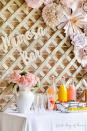 <p>Not feeling a bar cart? Use a spare table to really spread out your mimosa-making station. Add a white table cloth and vase full of flowers for a chic touch. If you want to go all out, add a glittery sign that lets folks know where the mimosa bar is at.</p><p>See more at <a href="https://www.firstdayofhome.com/mimosa-bar-ideas/" rel="nofollow noopener" target="_blank" data-ylk="slk:First Day of Home;elm:context_link;itc:0;sec:content-canvas" class="link ">First Day of Home</a>.</p>