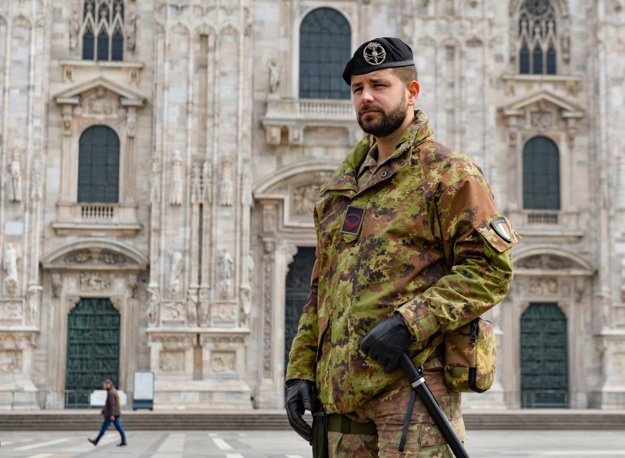 Soldiers of the Italian Army patrol around the Piazza Del Duomo: EPA