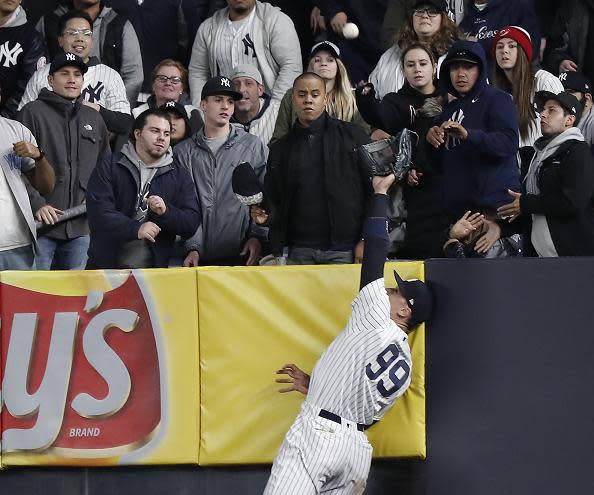 Yankees’ right fielder Aaron Judge takes away a potential game-winning home run from Baltimore’s Caleb Joseph. (AP)