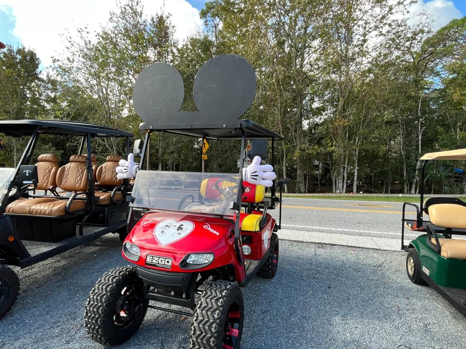 golf cart with mickey ears on it