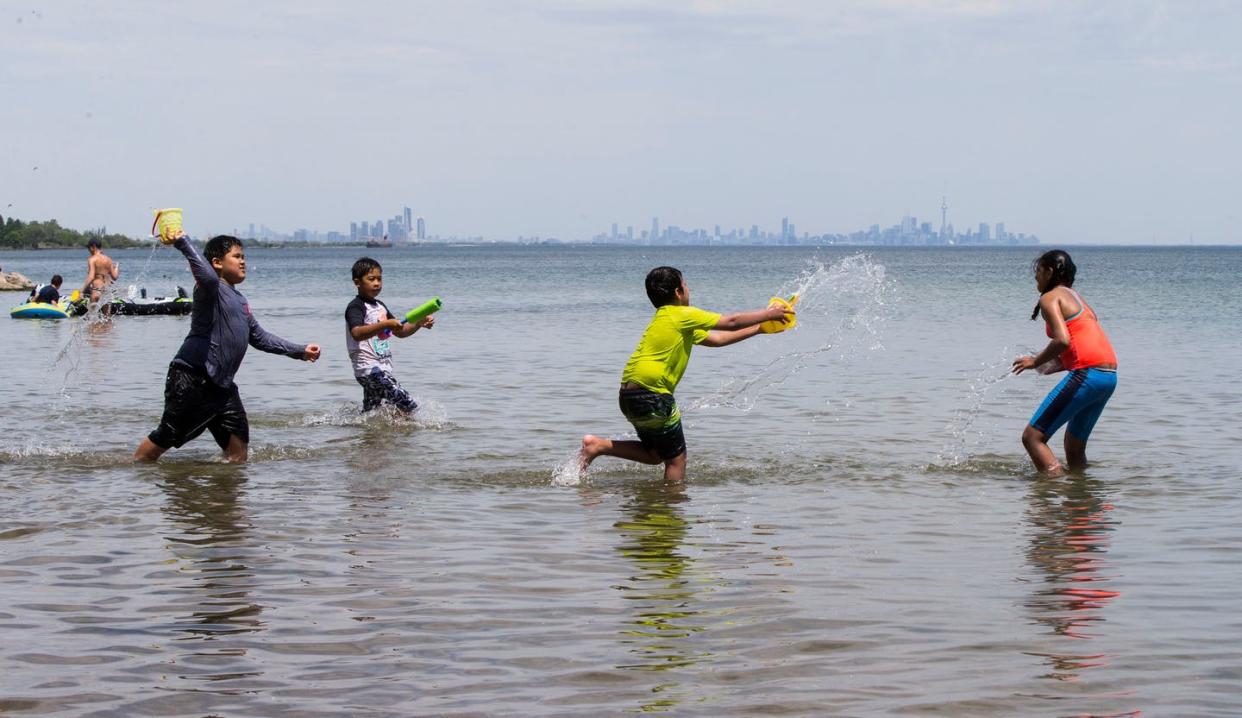 <span class="caption">Children participate in a water fight in Lake Ontario in Mississauga, Ontario, during a heat wave on June 5, 2021. </span> <span class="attribution"><a class="link " href="https://www.gettyimages.com/detail/news-photo/children-have-a-water-fight-at-lake-ontario-in-mississauga-news-photo/1233295324" rel="nofollow noopener" target="_blank" data-ylk="slk:Zou Zheng/Xinhua via Getty Images;elm:context_link;itc:0;sec:content-canvas">Zou Zheng/Xinhua via Getty Images</a></span>