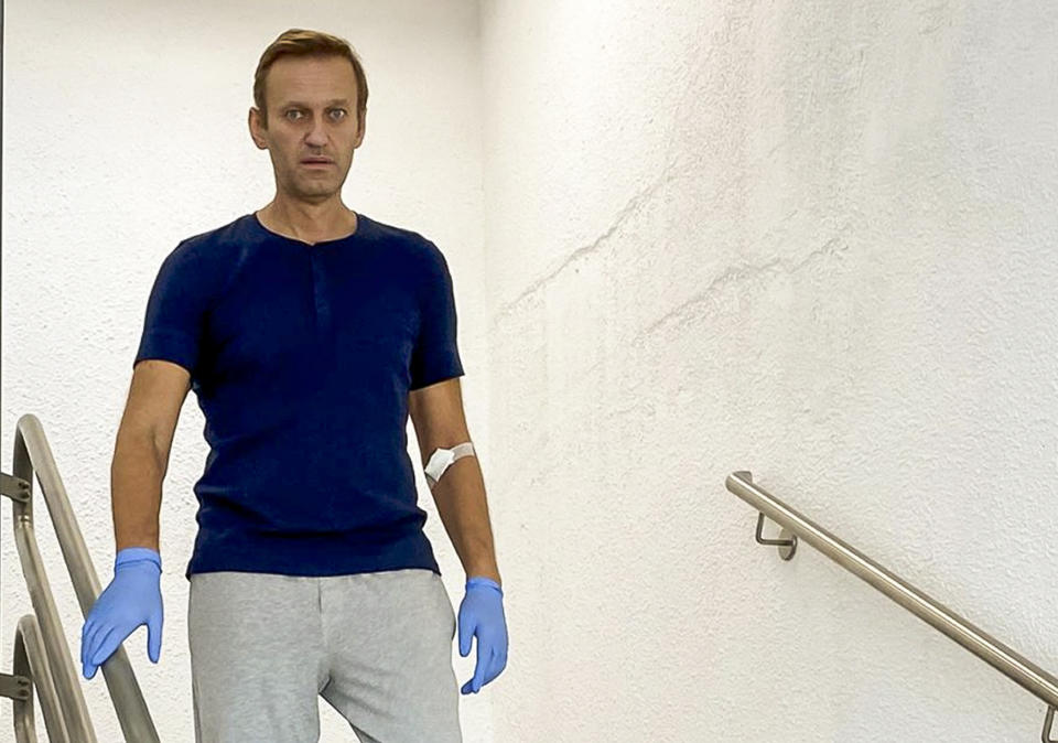 In this photo taken from a video published by Russian opposition leader Alexei Navalny on his instagram account, Russian opposition leader Alexei Navalny walks down stairs in a hospital in Berlin, Germany, Saturday, Sept. 19, 2020. The German hospital treating Russian opposition leader Alexei Navalny for poisoning says his condition improved enough for him to be released from the facility. The Charite hospital in Berlin said Wednesday Sept. 23, 2020 that after 32 days in care, Navalny's condition "improved sufficiently for him to be discharged from acute inpatient care." (Navalny Instagram via AP)