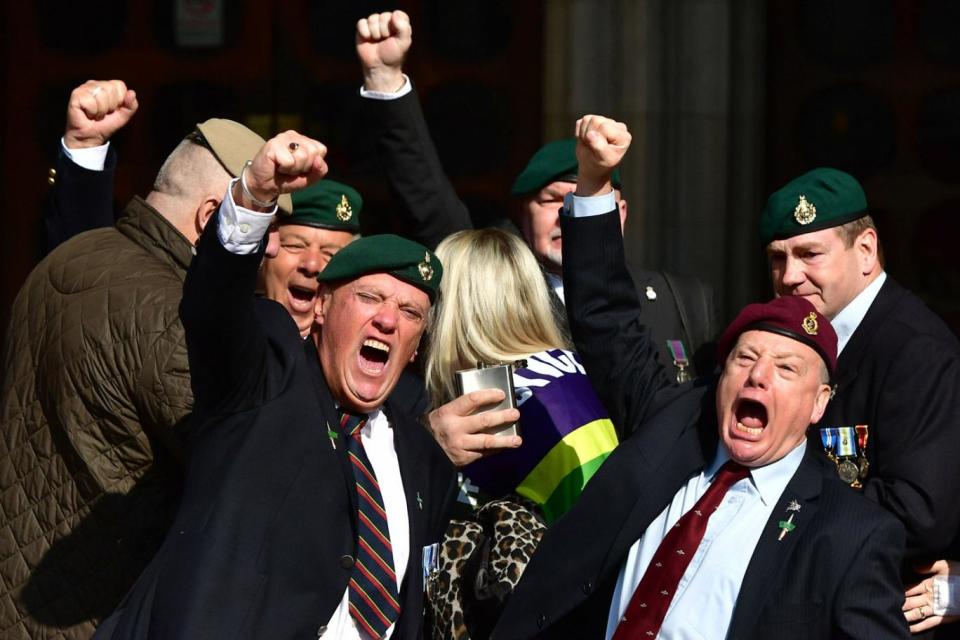 Freed: Supporters of Alexander Blackman celebrate outside the Royal Courts of Justice (Dominic Lipinski/PA)