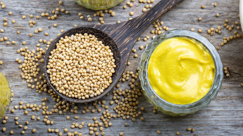 Spoonful of yellow mustard seeds