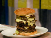 Novembar's restaurant in Perth features a fat boy challenge with a 1.3kg burger with seven beef patties, bacon, egg, cheese, onion and salad. The burger normally costs $28.50 but if you do the challenge you pay a dollar for every minute it takes you to eat it. So you could pay as little as $1 if you’re a superhuman eater or even $60 for a burger.