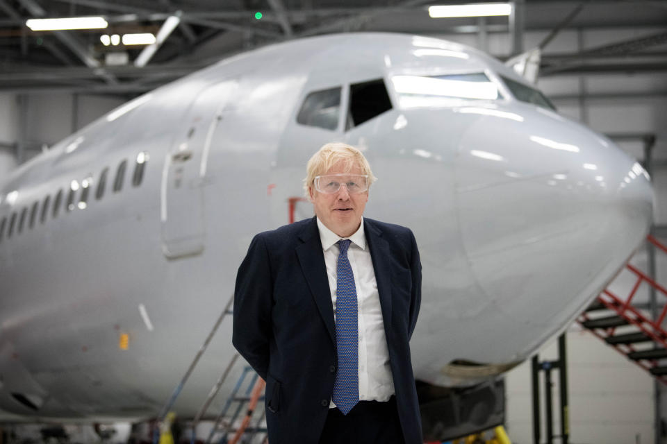 Prime Minister Boris Johnson in a hangar on a visit to the International Aviation Academy, Norwich, whilst on the General Election campaign trail.