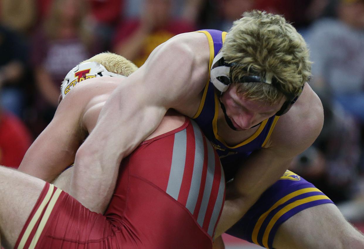Norther Iowa's Ryder Downey, right, goes for a takedown against Iowa State's Cody Chittum during their 157-pound bout on Feb. 11 in Ames.