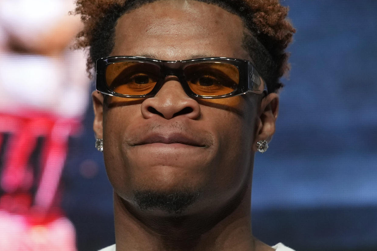 Devin Haney listens during a press conference Wednesday, May 17, 2023, in Las Vegas. Haney is scheduled to fight Vasiliy Lomachenko in a lightweight championship boxing match Saturday in Las Vegas. (AP Photo/John Locher)