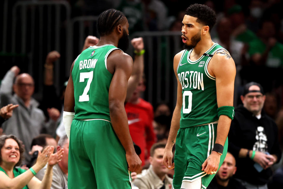 BOSTON, MASSACHUSETTS - MAY 03: Jayson Tatum #0 of the Boston Celtics and Jaylen Brown #7 celebrate during the third quarter of Game Two of the Eastern Conference Semifinals against the Milwaukee Bucks at TD Garden on May 03, 2022 in Boston, Massachusetts. NOTE TO USER: User expressly acknowledges and agrees that, by downloading and or using this photograph, User is consenting to the terms and conditions of the Getty Images License Agreement.  (Photo by Maddie Meyer/Getty Images)