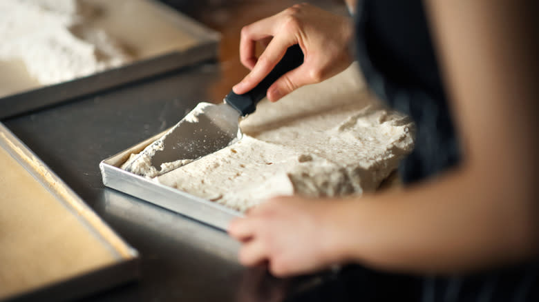 spreading batter in cake pan