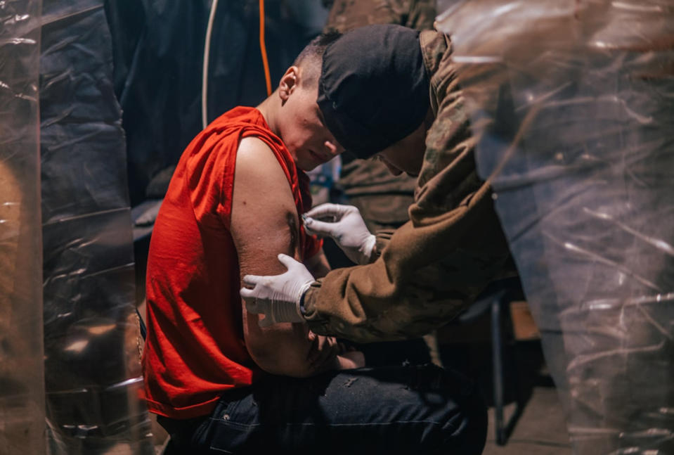 A wounded Ukrainian soldier is treated inside the steel plant in Mariupol. (Courtesy Lt. Ilya Samoilenko)