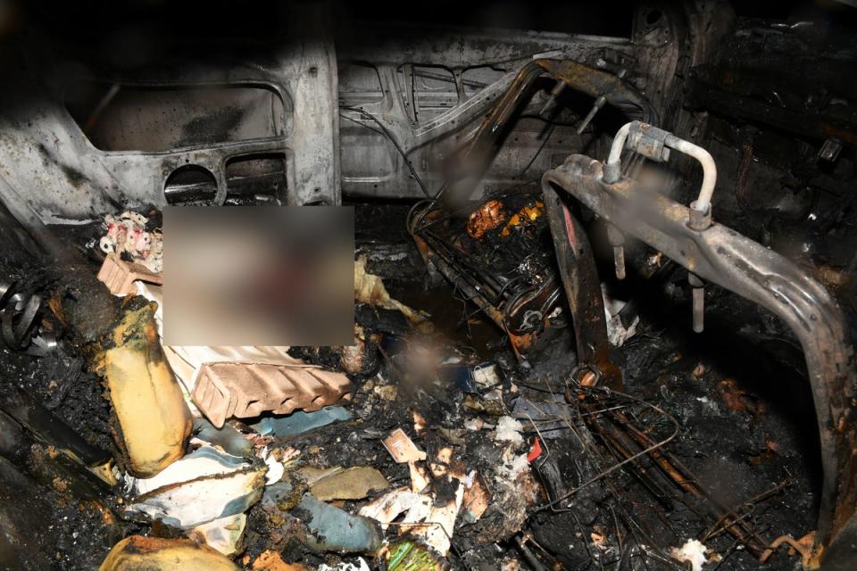 Photos of the inside of the burnt out vehicle were shown to the jury (PA)