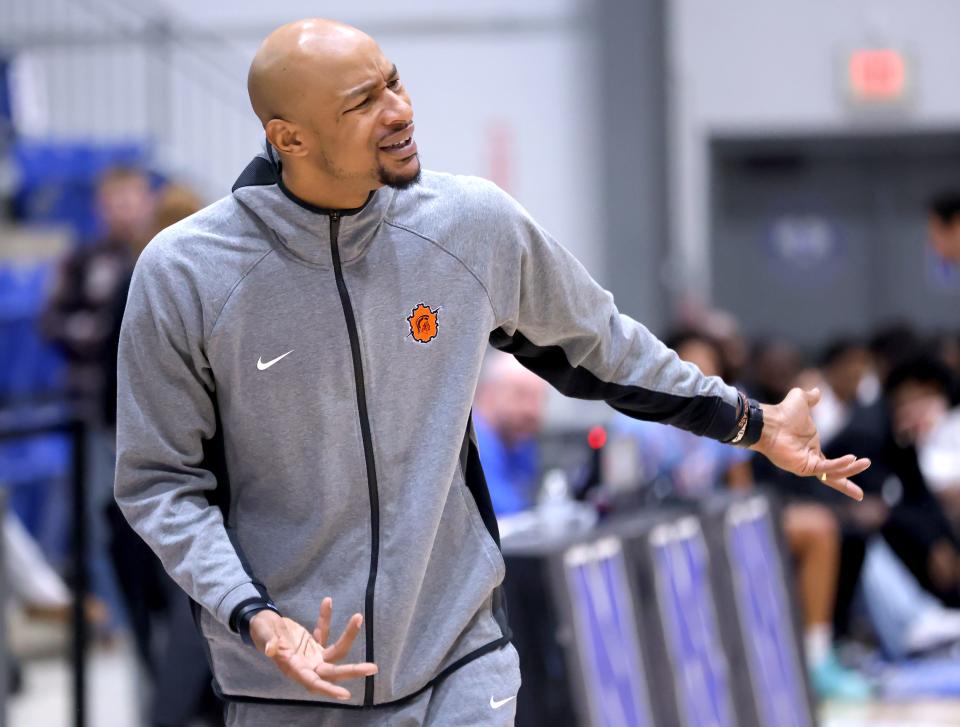 Douglass' head coach Steven Alexander reacts during the boys Sweet Pea Invitational basketball game between Douglass and Lawton Eisenhower at Newcastle High School in Newcastle, Okla. Thursday, Jan. 18, 2024.