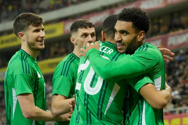 Jamie Reid, right, celebrates his goal 