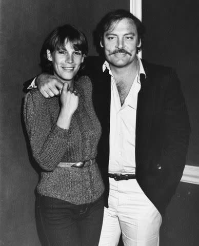 <p>Frank Edwards/Archive Photos/Getty</p> A young Jamie Lee Curtis and Stacy Keach