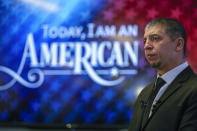 Deported veteran Mauricio Hernandez Mata looks on during an interview after being sworn in as a U.S. citizen at a special naturalization ceremony on Wednesday, Feb. 8, 2023, in San Diego. (AP Photo/Gregory Bull)