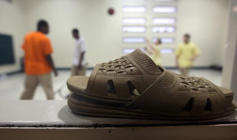 Juvenile offenders play basketball in the Campbell Regional Juvenile Detention Center in Newport. Two nurses who worked at the facility allege administrators tried to cover of reports of sexual abuse.