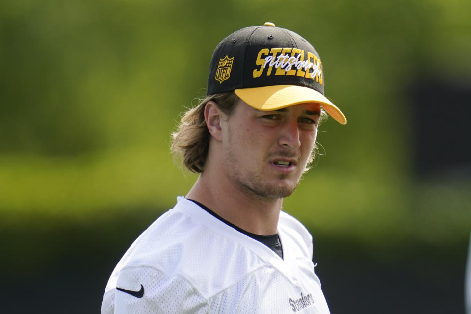 FILE - Pittsburgh Steelers quarterback Kenny Pickett participates in an NFL football practice in Pittsburgh, Pa., on Tuesday, May 24, 2022. The Steelers enter training camp with the starting quarterback job up for grabs for the first time in nearly 20 years following Ben Roethlisberger's retirement in January. (AP Photo/Keith Srakocic, File)