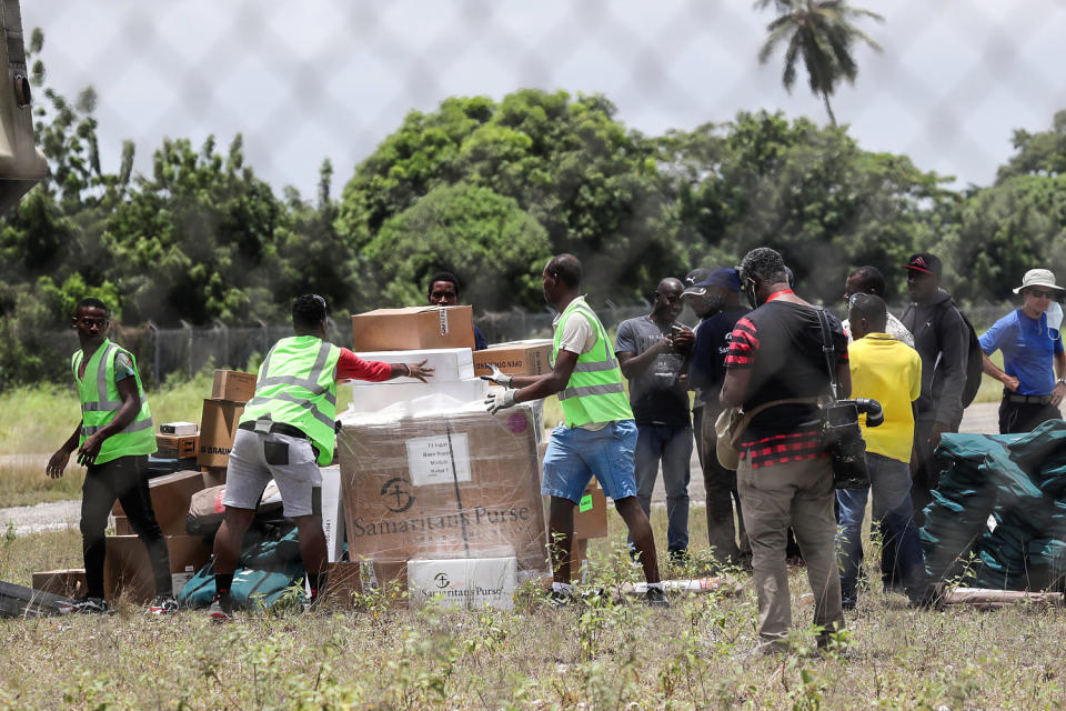 Image: Workers unload humanitarian aid from a U.S. helicopter at Les Cayes airport in Haiti, Aug. 18, 2021. (Henry Romero / Reuters file)