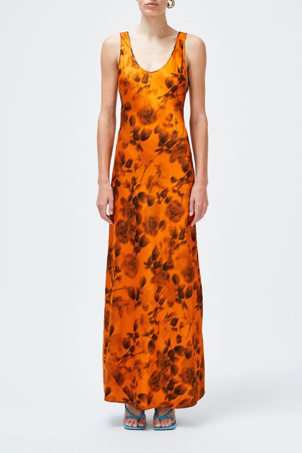 <p>Galvan London Burnt Valletta Dress, $810 (from $1,350), <a href="https://www.theyes.com/p/galvan-london/dress/burnt-floral-valletta-dress-sunset-orange" rel="nofollow noopener" target="_blank" data-ylk="slk:available here;elm:context_link;itc:0;sec:content-canvas" class="link ">available here</a> (sizes FR 34-FR 44). </p>