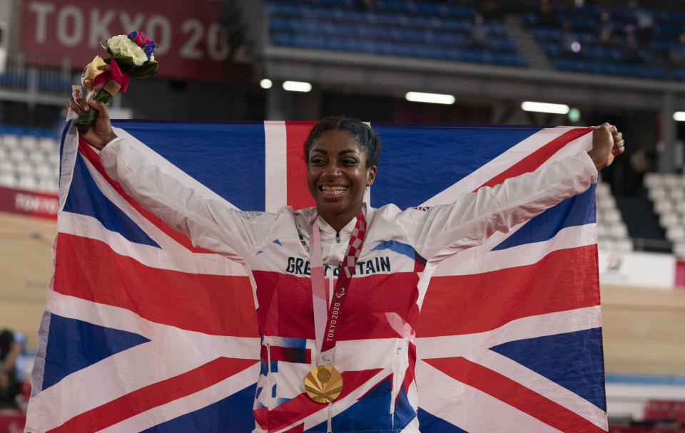 Kadeena Cox, 30, celebrates after defending her C4-5 500m time trial Paralympic title (Credit: imagecomms)