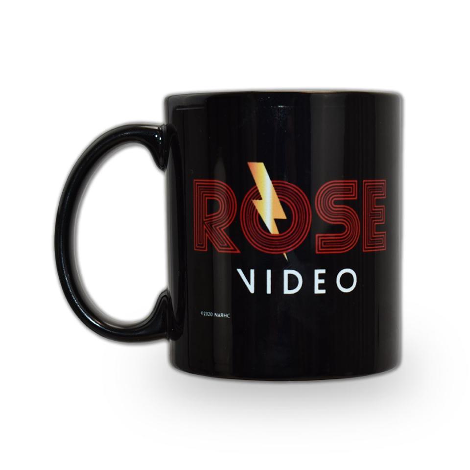 <p><strong>Schitt's Creek Shop</strong></p><p>schittscreek.shop</p><p><strong>$16.00</strong></p><p><a href="https://schittscreek.shop/product/rose-video-mug-black/" rel="nofollow noopener" target="_blank" data-ylk="slk:Shop Now;elm:context_link;itc:0;sec:content-canvas" class="link ">Shop Now</a></p><p>For the "if you know you know" <em>Schitt's Creek</em> fan out there, this vintage-inspired coffee mug from the official store is the perfect drink receptacle that doubles as an inside joke. </p>