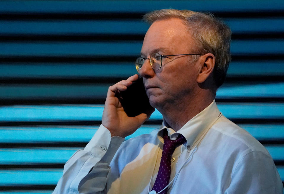 Former Alphabet's Executive Chairman Eric Schmidt speaks on the phone during the World Economic Forum (WEF) annual meeting in Davos, Switzerland January 24, 2018.  REUTERS/Denis Balibouse