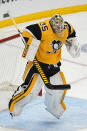 Pittsburgh Penguins goaltender Tristan Jarry (35) celebrates as times runs out in Game 2 of the team's NHL hockey Stanley Cup first-round playoff series against the New York Islanders in Pittsburgh, Tuesday, May 18, 2021. The Penguins won 2-1. (AP Photo/Gene J. Puskar)